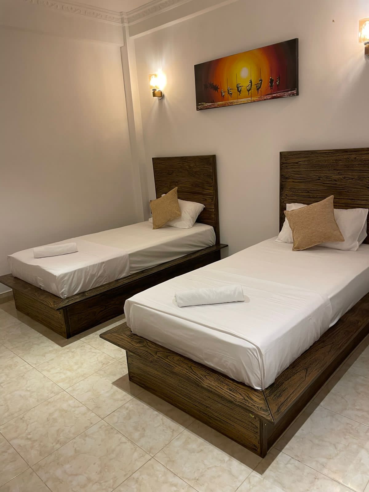 Bedroom with warm lighting and modern furnishings